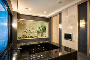 Economy Double Room | Bathroom | Separate tub and shower, free toiletries, hair dryer, slippers