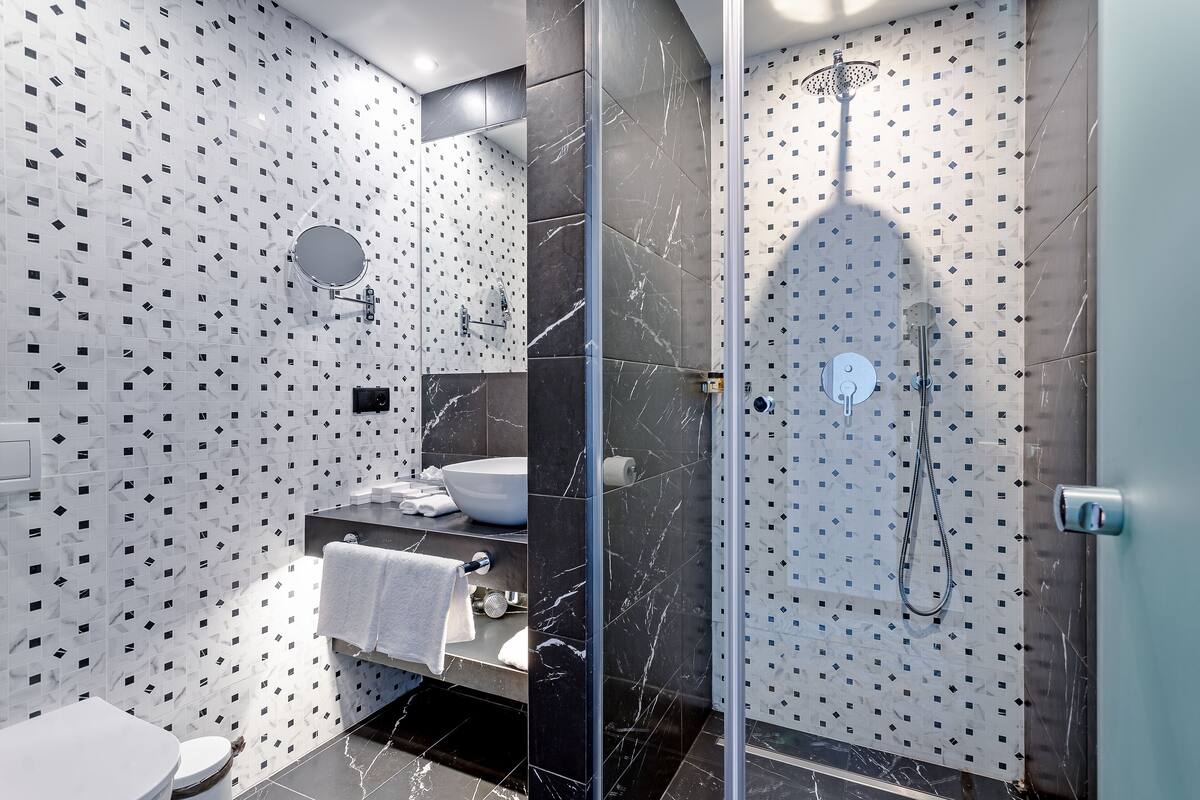 shower, free toiletries, hair dryer, bathrobes