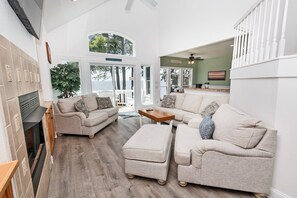 TV, fireplace, books