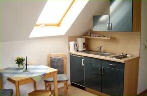 Apartment, 2 Bedrooms (Silke) | Private kitchen | Fridge, high chair, cookware/dishes/utensils