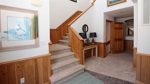 A staircase with wooden railings and a carpeted floor leading to a hallway. - Oceanside, Private Pool, Hot Tub, Sun Decks, WC1077, Seaside Manor (Corolla)