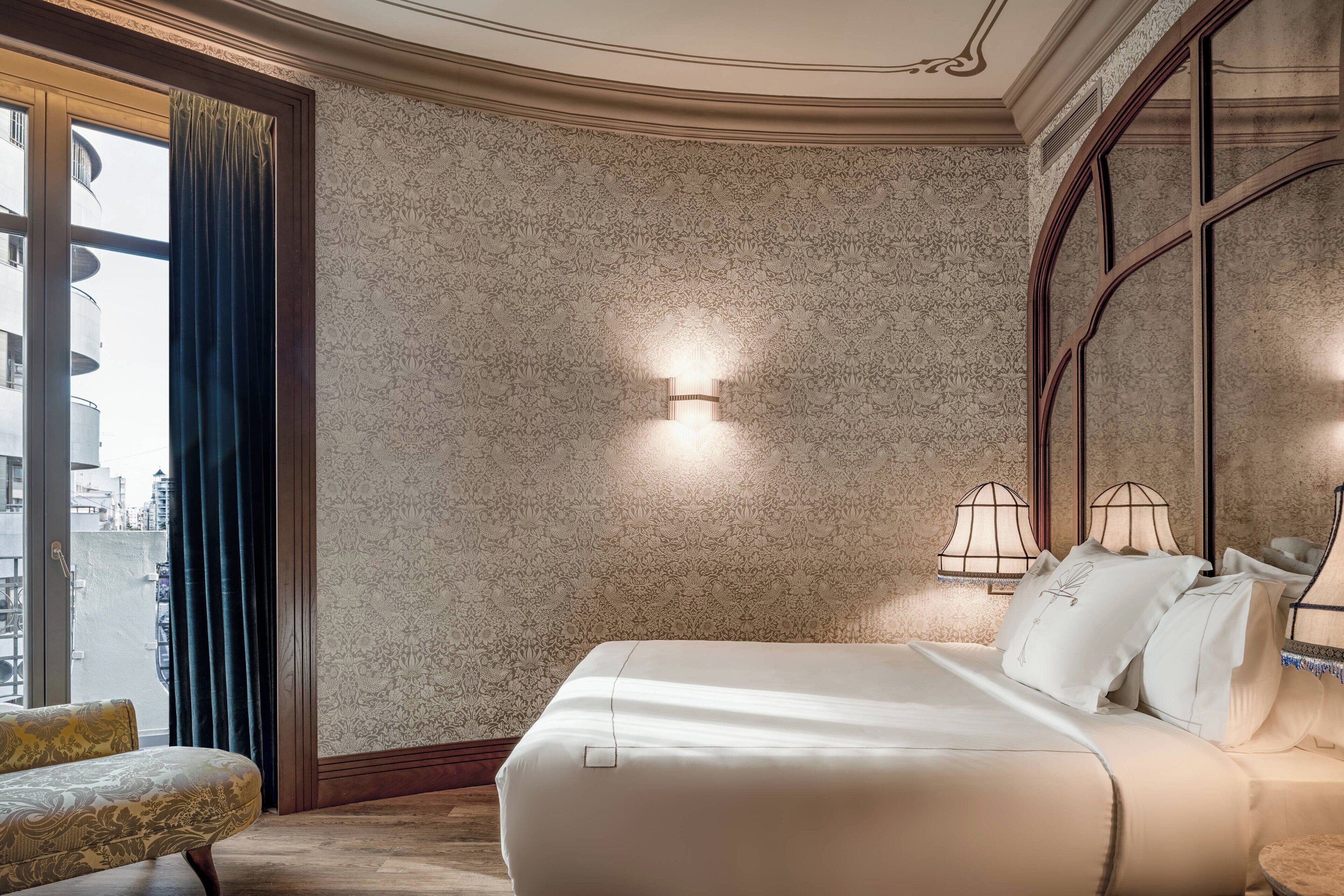 deluxe room, 1 queen bed, non smoking, city view | minibar, in-room safe, individually furnished, desk