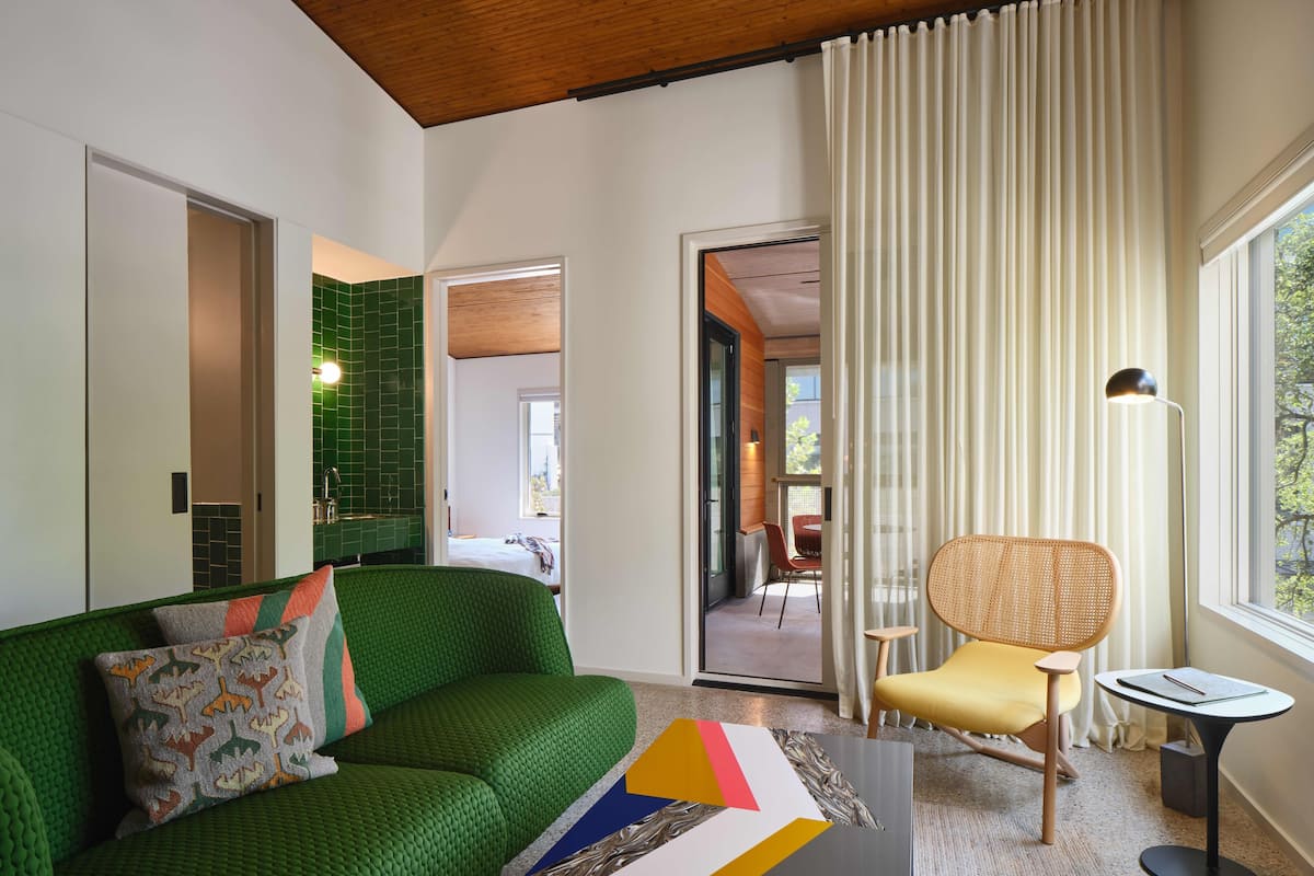 King Suite with Patio | Living area | 42-inch Smart TV with digital channels, TV, Netflix