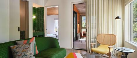 Suite, 1 King Bed, Patio | Living area | 42-inch Smart TV with digital channels, TV, Netflix