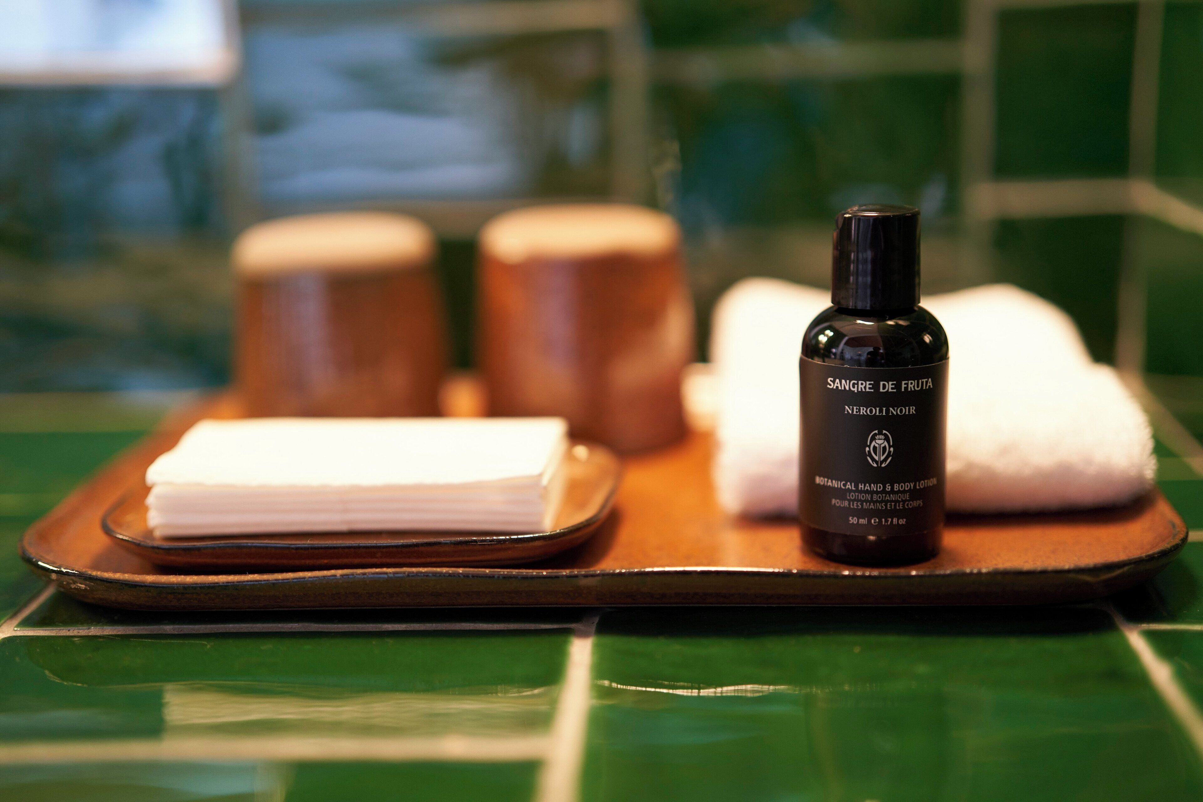 rainfall showerhead, hair dryer, bathrobes, towels