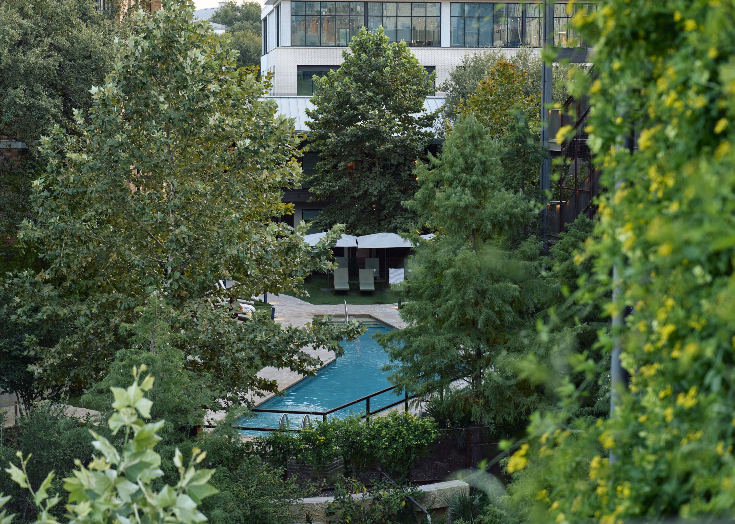 outdoor pool, open 8:00 am to 10:00 pm, pool umbrellas