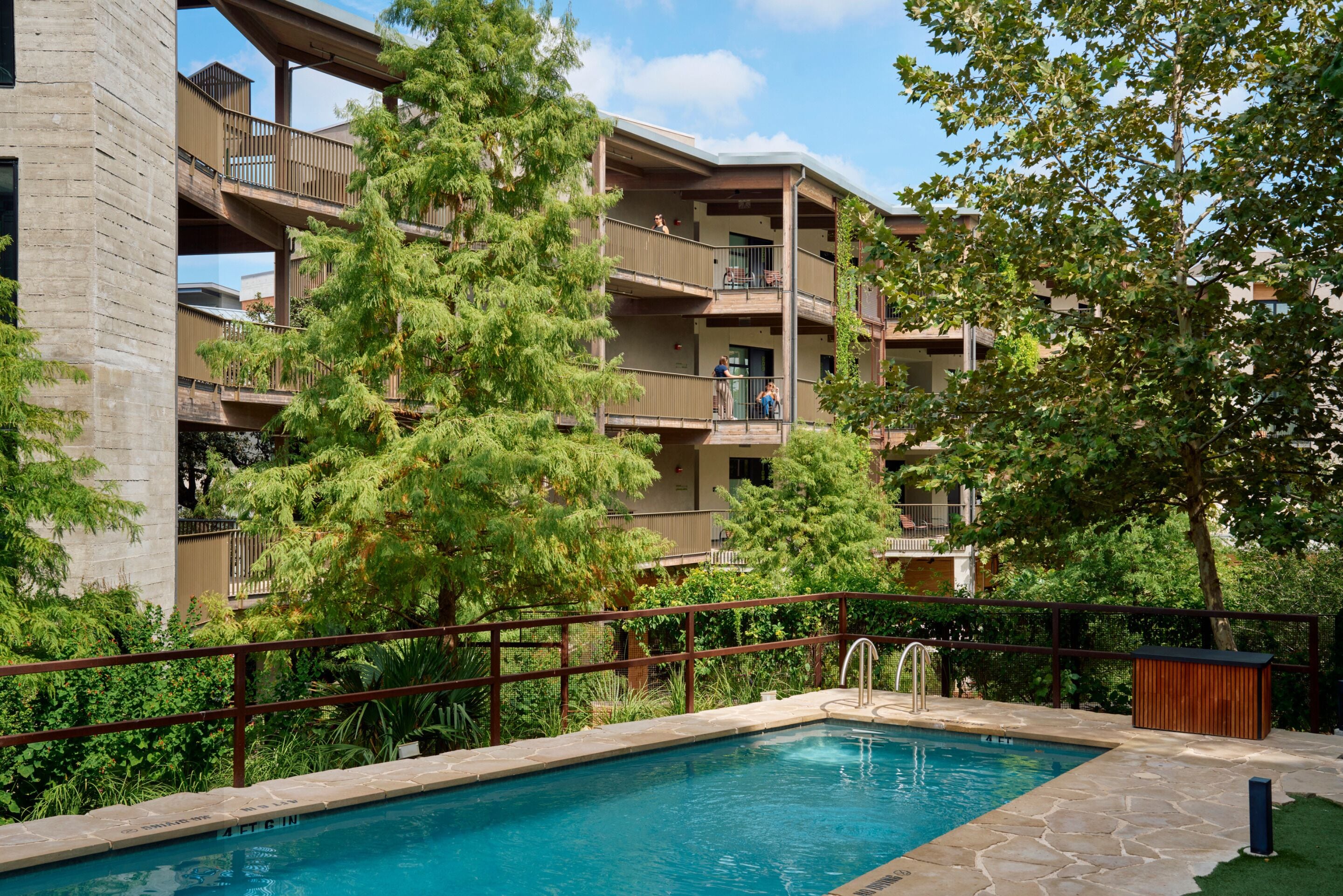 Outdoor pool, open 8:00 AM to 10:00 PM, pool umbrellas