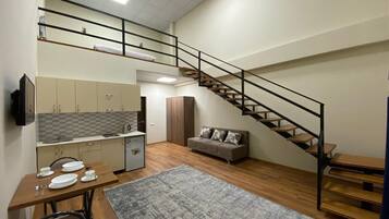 Family Penthouse | Minibar, desk, laptop workspace, blackout curtains