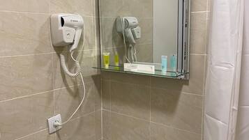 Shower, free toiletries, hair dryer, slippers