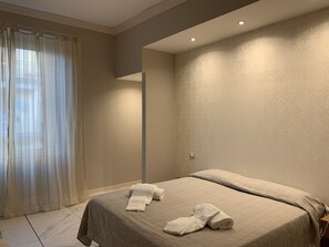 Familiekamer | Een bureau, gratis wifi, beddengoed
