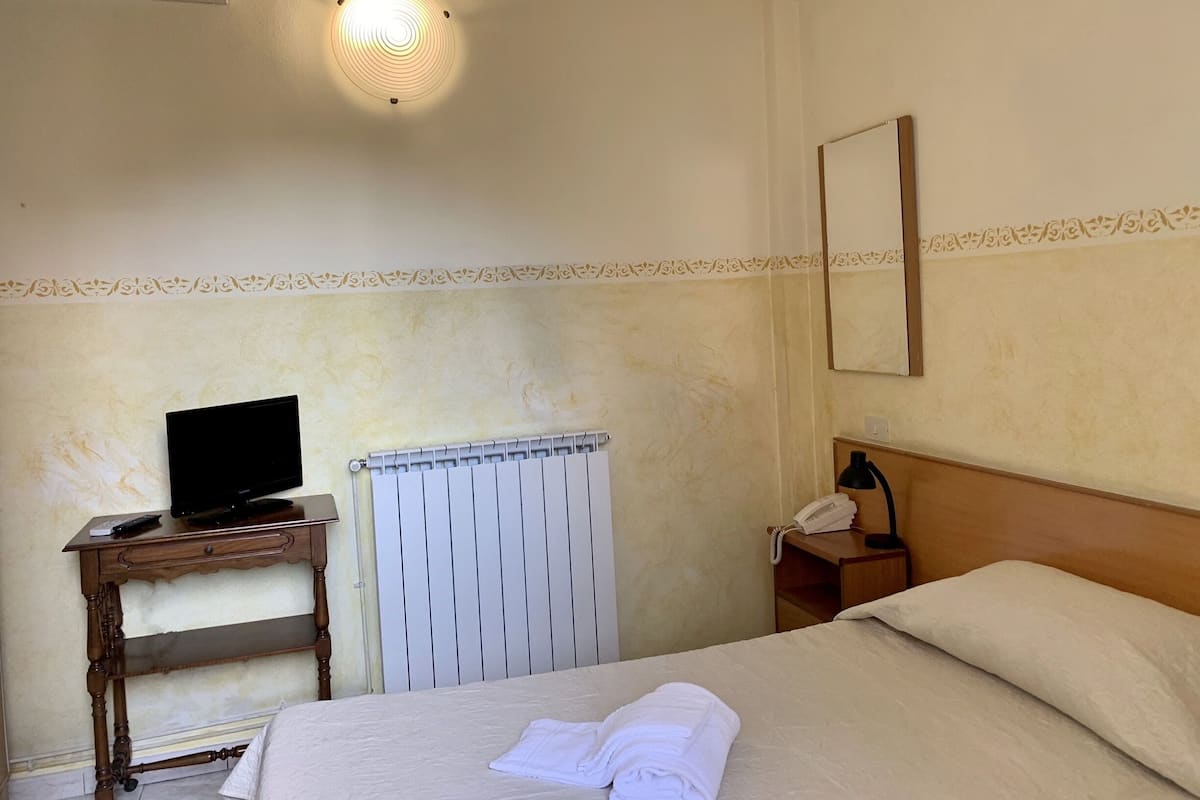 Eenpersoonskamer | 1 slaapkamer, een bureau, gratis wifi, beddengoed