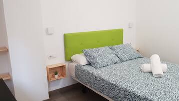 Habitación doble, baño privado | Wifi gratis y ropa de cama