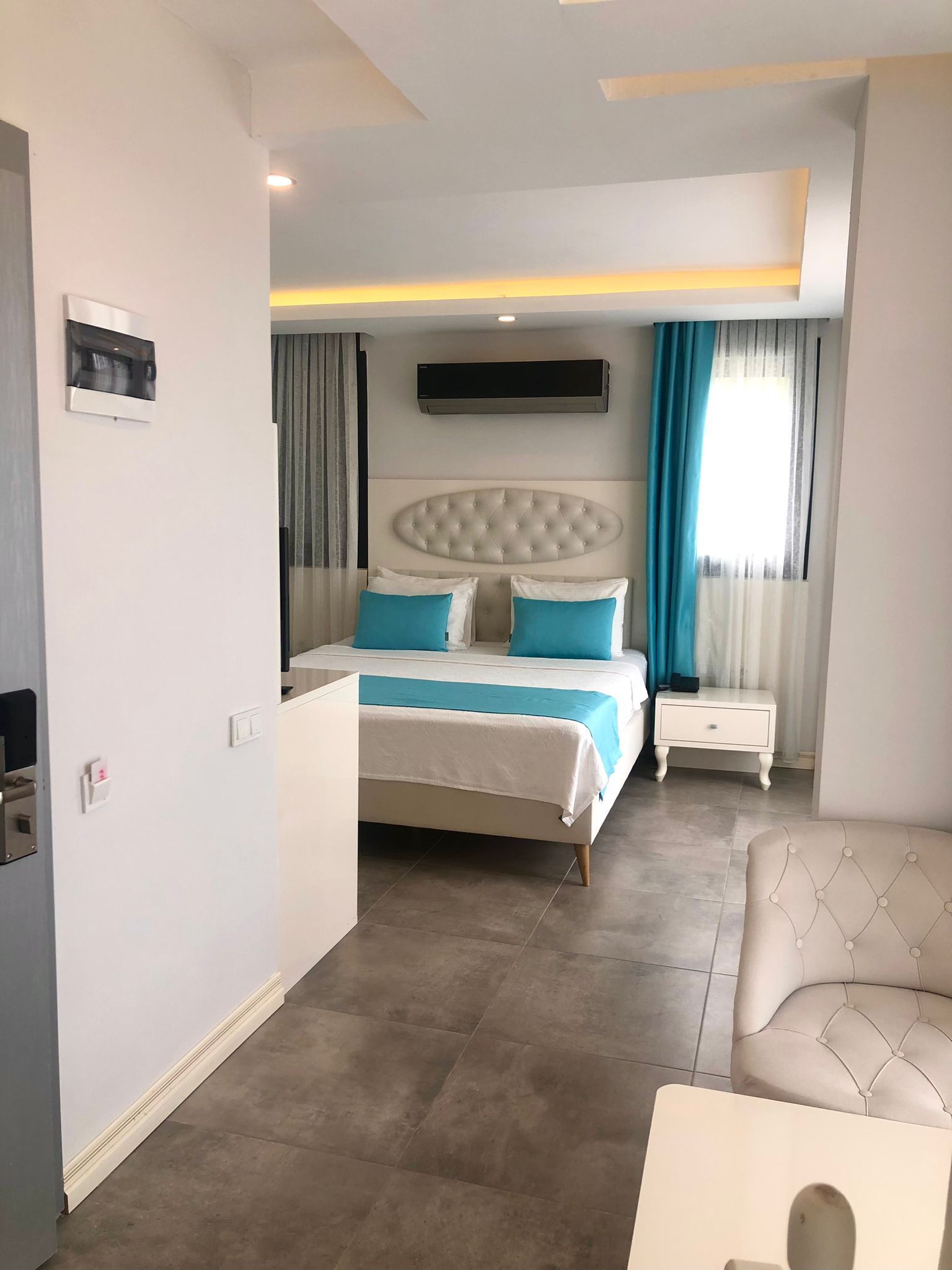 family room,multiple beds,pool view | premium bedding, minibar, in-room safe, laptop workspace