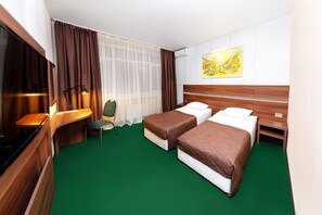Standard Twin Room | Minibar, desk, iron/ironing board, free WiFi
