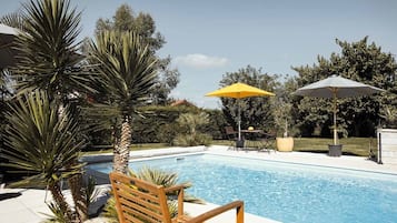 Seasonal outdoor pool, pool umbrellas, sun loungers