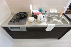 Standard Room | Private kitchenette | Fridge, microwave, stovetop, electric kettle