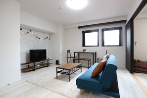 Standard Room | Living area | Flat-screen TV