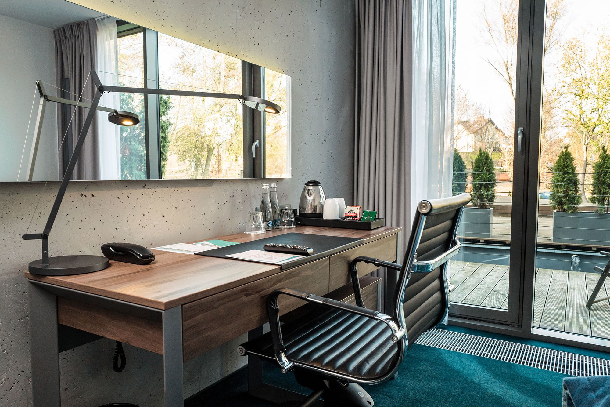 deluxe double or twin room (with terrace) | living area | lcd tv