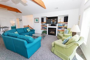 TV, fireplace, books - Oceanside, Pool, Hot Tub, Community Amenities, VOH20, Laughing Duck (Corolla)