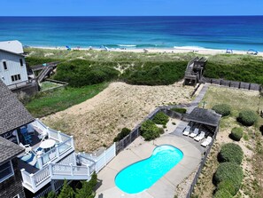 A residential property with a swimming pool, beach access, and a view of the ocean. - OCEANFRONT, Private Pool, Private Beach Access, Hot Tub, SSV124, Aint Life Grand (Duck)