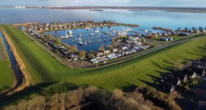 Modern Holiday Home at a Typical Dutch Canal, Close to the Lauwersmeer