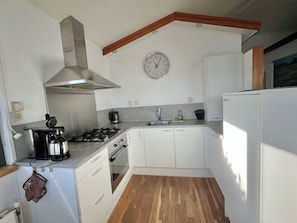Bungalow, 3 Bedrooms, Patio, Garden View | Private kitchen | Microwave, coffee/tea maker - 6 Pers Lauwersmeer Waterfront, Full Equipped and Modern House With Sauna (Anjum)