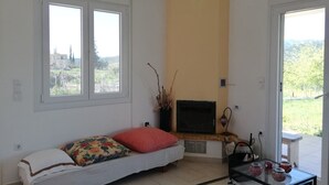 Villa | Living area | Flat-screen TV, fireplace - Antonia's New House with Amazing Garden (Dirfys-Messapia)