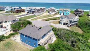 A coastal residential area with houses featuring balconies and a view of the ocean. - Semi-Oceanfront, Private Pool, Poolside Bar, Hot Tub, Ocean Views! T1, Sailaway (Kitty Hawk)