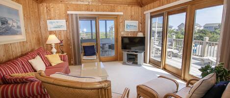 Téléviseur, livres, chaßne audio