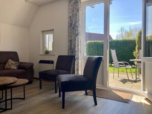 Bungalow, 3 Bedrooms, Balcony, Garden View | Living room | TV, fireplace - Cozy Holiday Home by the Dike in a Quiet Location at Lauwersmeer (Anjum)