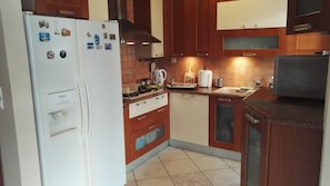 Apartment | Private kitchen | Fridge, microwave, oven, stovetop - Cozy 2 Bedroom Apartment close to Sea & Center (Athens)