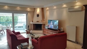 Apartment | Wohnbereich | Flachbildfernseher, Kamin