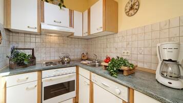 Apartment | Private kitchen | Fridge, stovetop, dishwasher, coffee/tea maker