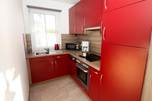 Apartment | Eigene Küche | Kühlschrank, Mikrowelle, Herdplatte, Geschirrspüler