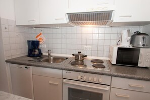 Apartment | Eigene Küche | Kühlschrank, Mikrowelle, Herdplatte, Geschirrspüler
