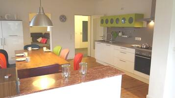 Apartment | Private kitchen | Fridge, microwave, stovetop, dishwasher