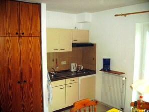 Refrigerador, placa de cocina