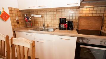 Apartment | Private kitchen | Fridge, microwave, stovetop, dishwasher