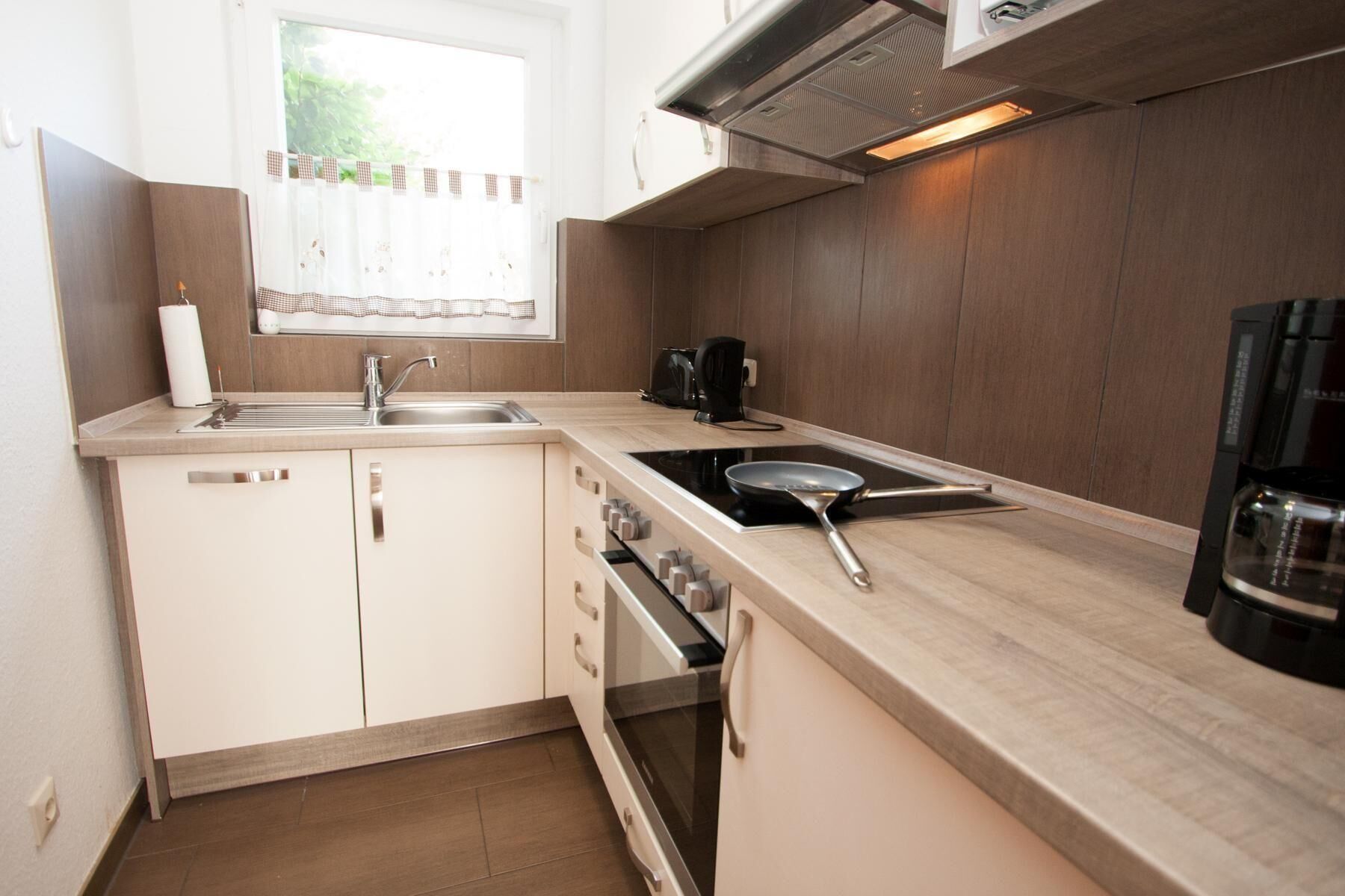 Apartemen | Dapur pribadi | Lemari es, microwave, kompor, dan mesin pencuci piring