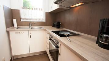 Apartemen | Dapur pribadi | Lemari es, microwave, kompor, dan mesin pencuci piring