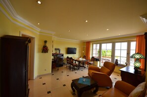 Apartment (Ferienwohnung Sonnenkamp in Groß Zic) | Wohnzimmer | Fernseher