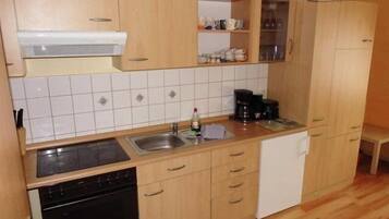 Apartment | Private kitchen | Fridge, stovetop, dishwasher, coffee/tea maker
