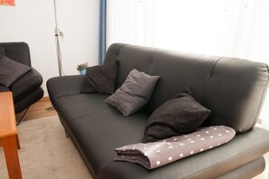 Apartment | Wohnzimmer | Fernseher, Kamin