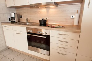 Apartment | Eigene Küche | Kühlschrank, Mikrowelle, Herdplatte, Geschirrspüler