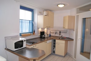 Apartment | Eigene Küche | Kühlschrank, Mikrowelle, Herdplatte, Geschirrspüler