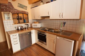 Apartment | Eigene Küche | Kühlschrank, Mikrowelle, Herdplatte, Geschirrspüler