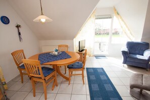 Living room - Ferienwohnung in Carolinensiel für 4 Personen und ein Kleinkind 50030 (Wittmund)