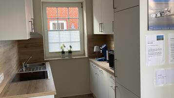 Apartment (Ferienwohnung Am Südstrand) | Private kitchen