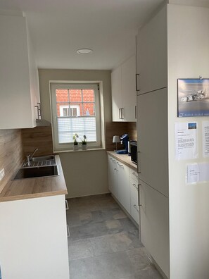 Căn hộ (Ferienwohnung Am Südstrand) | Bếp riêng