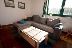 Ferienhaus | Wohnzimmer | Fernseher